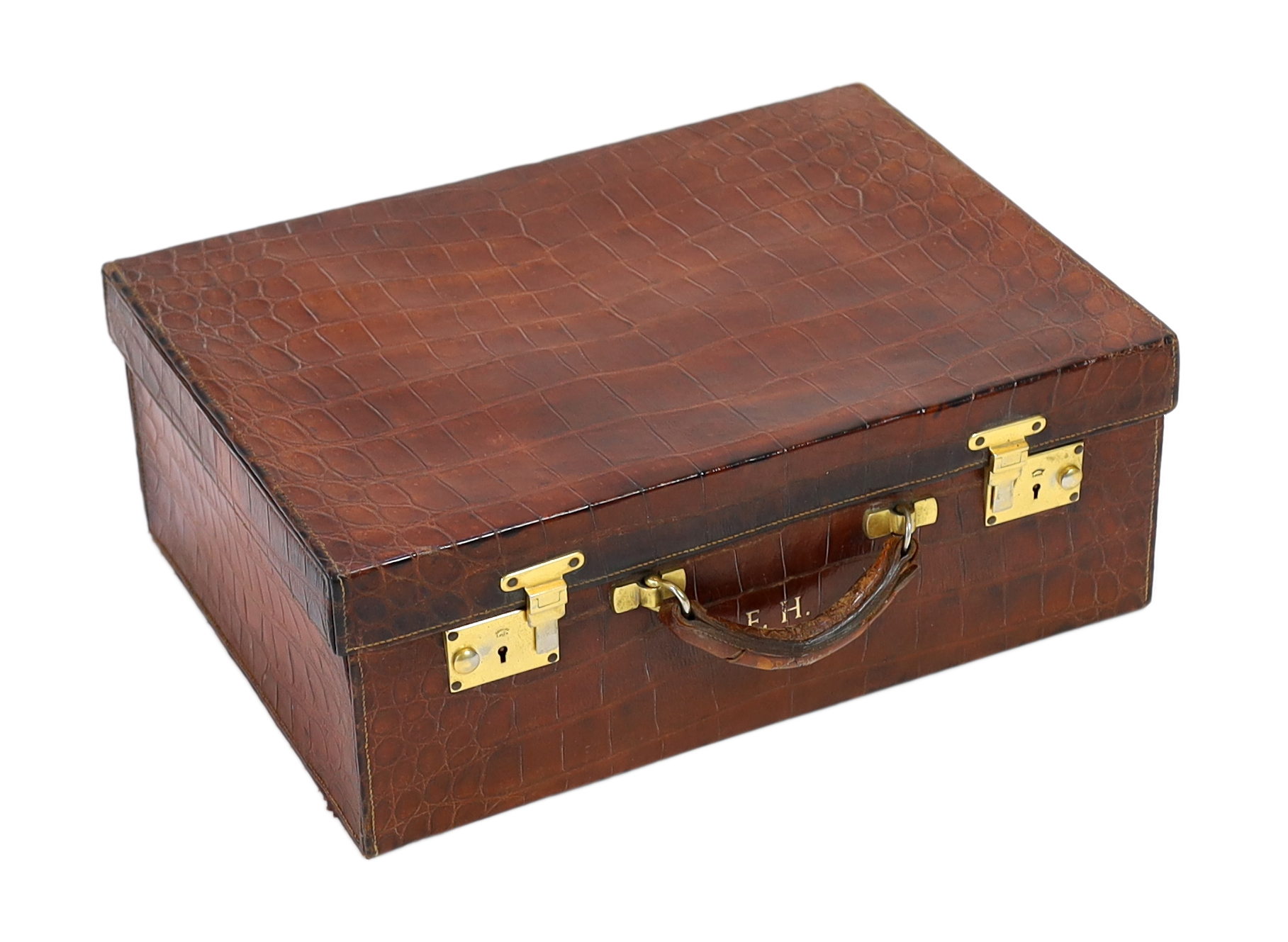 A 1920's crocodile skin suitcase, width 50cm, height 37cm, depth 19cm